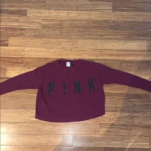 A Victoria’s Secret PINK thermal long sleeve